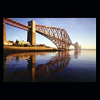 iron metal train transport travel history historic historical construction industry industrial blue sea sky skies estuary water
 engineering crossing spanning span over structure stone  Scottish photographs Doug Houghton