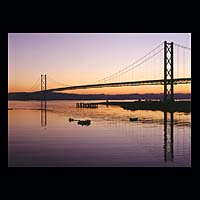 roadbridge boats anchored pier transport travel history historic historical construction industry industrial orange purple night sky
 skies crossing spanning span over metal concrete  Scottish photographs Doug Houghton